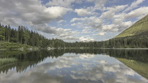 Clouds mirroring in Lake Hintersee, Bavaria, Berchtesgadener Land Stock Footage 167738612