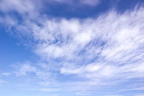 Clouds in motion in a blue sky Stock Photos