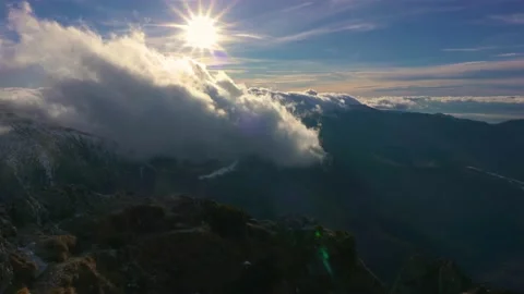 Clouds motion fast over mountains in sunny morning nature Time lapse Stock Footage 239318851