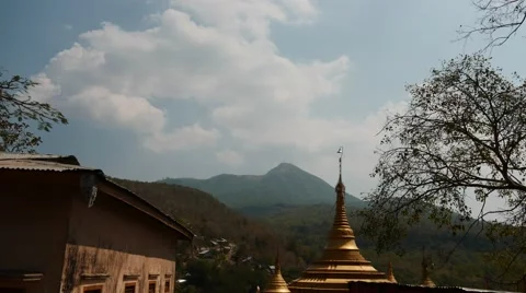 Clouds motion with shadows on ground - Myanmar time lapse Stock Footage 61781516
