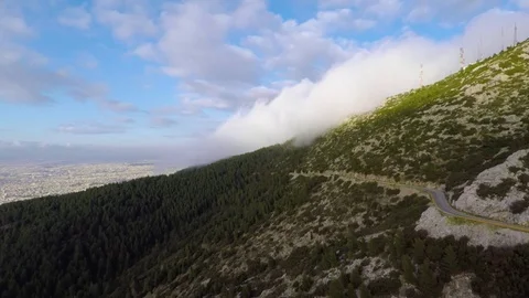 Clouds on mountain side 스톡 동영상 106339095