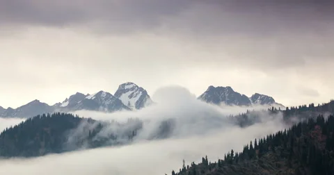 Clouds in the mountain summit Video stock 54806896
