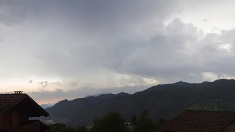 Clouds on the mountain at the sunset Stock Footage 98307509