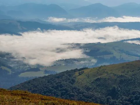 Clouds in the mountain valley. 스톡 사진