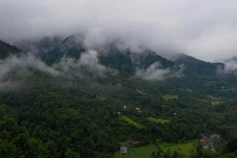 Clouds in the mountains from a drone Stock Photos