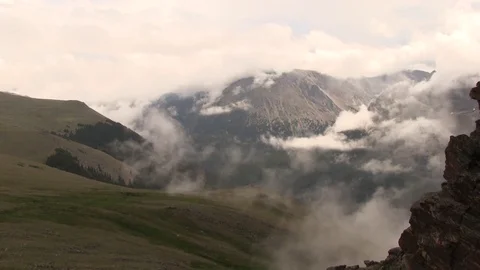 Clouds in mountains Stock Footage 83098353