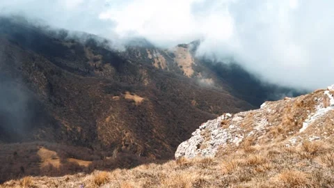 Clouds in the mountains at high altitude Stock Footage 133228785
