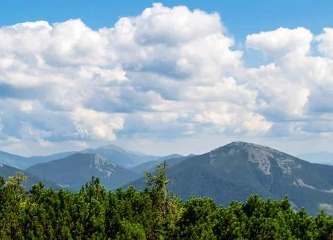 Clouds in mountains Stock Photos