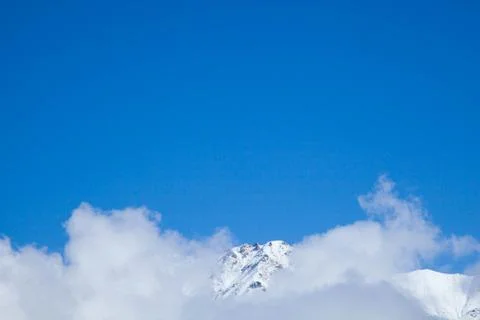 Clouds in the mountains Stock Photos