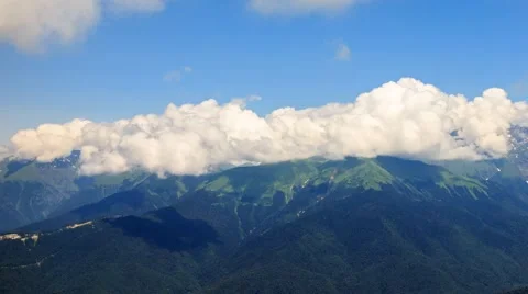Clouds in the mountains. Time Lapse. Krasnaya Polyana, Sochi, Russia. 1280x720 Stockbeeldmateriaal 53607084