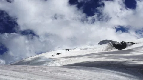 Clouds in mountains timelaps. Top of the mountain Kazbek. background Video stock 68682237