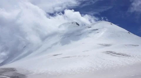 Clouds in mountains timelaps. Top of the mountain Kazbek. background Video stock 68682257
