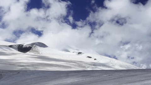 Clouds in mountains timelaps. Top on mountain. background Video stock 74715518
