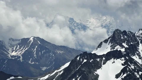Clouds in the mountains timelapse. Video stock 219556075