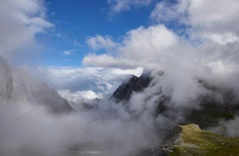 Clouds in mountains - top, bottom, middle Stock Photos