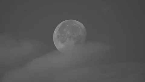 Clouds move across the moon Stock Footage 116099633