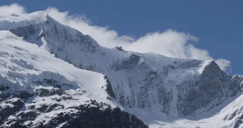 Clouds move across Rob Roy Glacier in New Zealand Video stock 119552748
