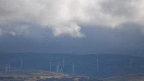 Clouds move across a windfarm Stock Footage 116390313