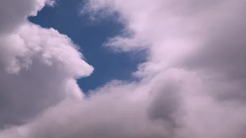 The clouds move along the blue sky. Stock Footage 89351686
