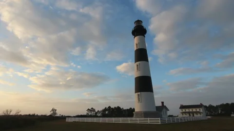 Clouds move behind the bodie island lighthouse Stock Footage 44875929