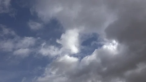 Clouds move in blue sky Stock Footage 93055785