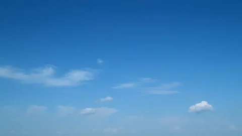 Clouds move in the blue sky. Running clouds against the blue sky. Timelapse. Stock Footage 217377949