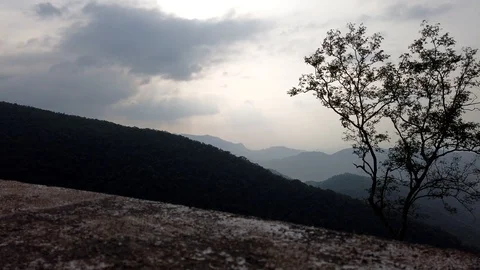 Clouds move in dark forest a time lapse lambasingi india 2nd kashmir Stock Footage 114700199