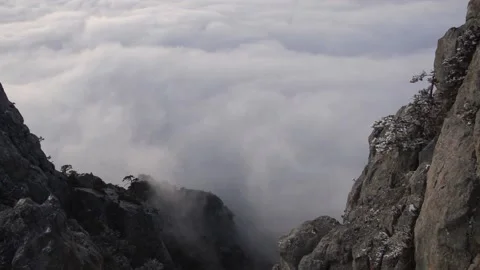 Clouds move fast near mountains Stock Footage 90333639