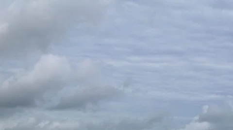Clouds move L-R building into storms-1 Stock Footage 27945253