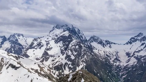 Clouds move over the Caucasus Mountains. Time-lapse Video stock 78976324