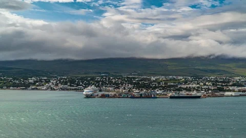 Clouds move over icelandic town Akureyri Stock Footage 116531576