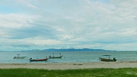 Clouds move over the island during sunset Stock Footage 154463973
