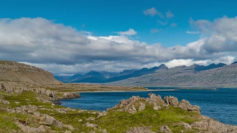 Clouds move over the mountains in Iceland Stock Footage 116675376