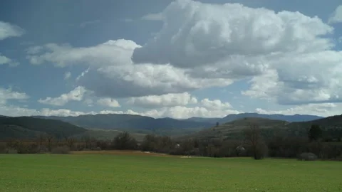 Clouds move over a valley, time lapse. Stock Footage 188125696