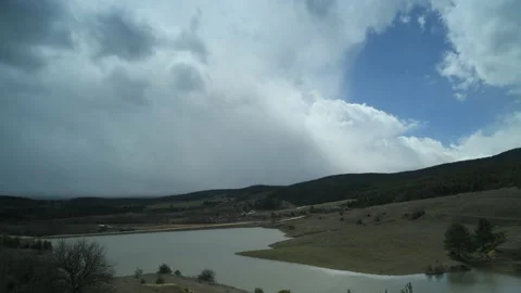 Clouds move over a valley, time lapse. Stock Footage 188127472