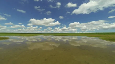Clouds move reflected in the water Stock-Footage 39875265