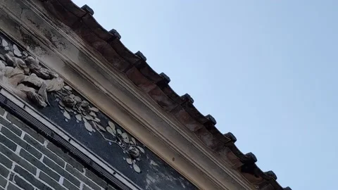 Clouds move slowly past an old building 스톡 동영상 147170850