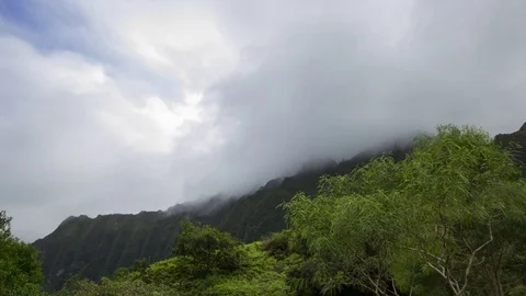 Clouds Move Through Hawaii Mountain 4K Stock Footage 74528144
