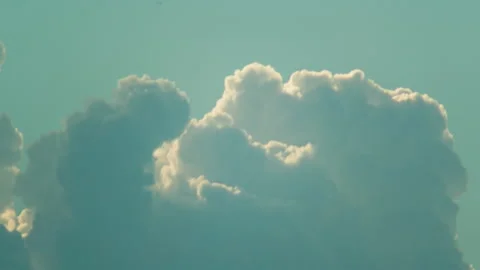 Clouds moved by the wind during summer day in a blue sky Stock Footage 141816596