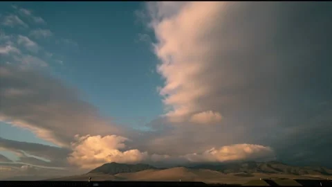 Clouds movement after the rain over the hill at sunset Stock Footage 156144582