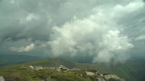 Clouds Movement over Mountain Range 4K Stock Footage 64220353