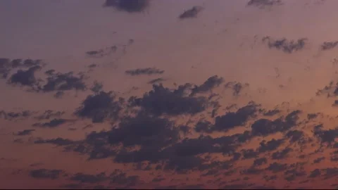 Clouds movement time lapse at evening. Purple cloudsnon sky. Stock Footage 131367411