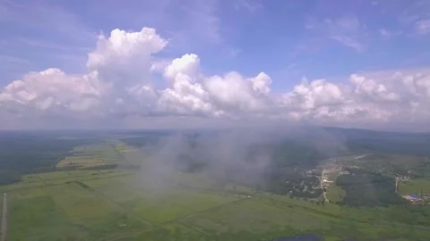 Clouds movements over the green hills and pastures Stock Footage 138137460