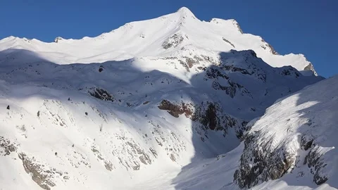 Clouds moves over the mountain in snow Stock Footage 239344409