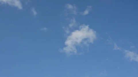 Clouds movig across blue sky  库存影片 8679738