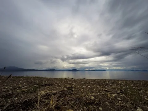 Clouds moving above the lake timelapse 스톡 동영상 70828365