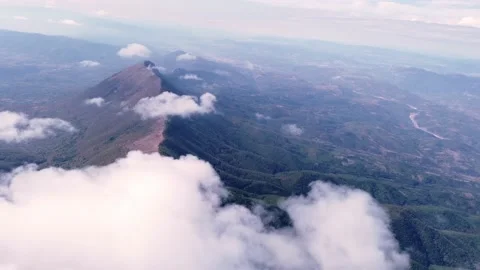 Clouds moving above a mountain 库存影片 168839427