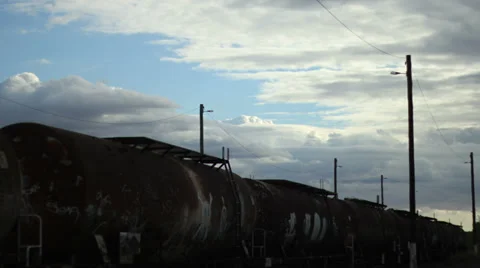Clouds moving above rail yard Stock Footage 39133616