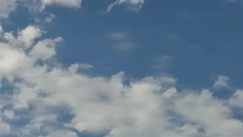  Clouds moving across blue sky. Stock Footage 137142133