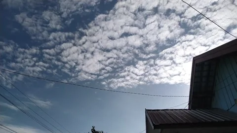 Clouds Moving Across Blue Sky Time Lapse Stock Footage 328367151